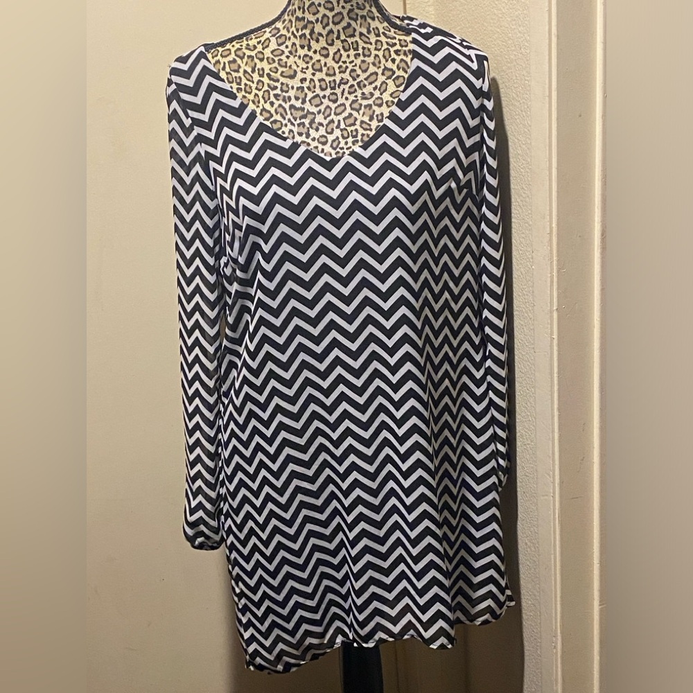 Zebra print sexy top with slit sleeves from shoulder to wrist.